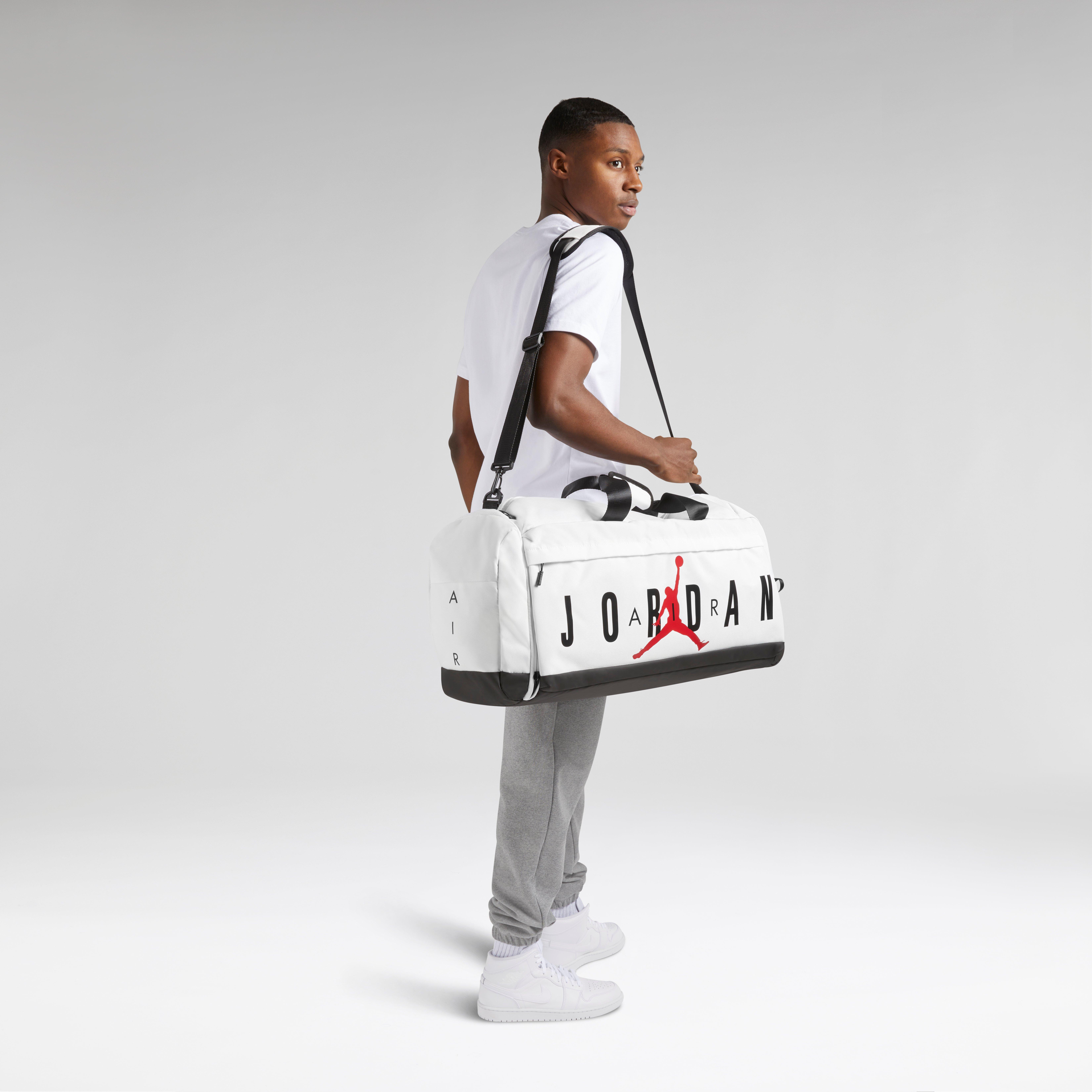 Air Jordan Duffle Bag - Large Pros: 
                  -great quality material 
                  -durable 
                  -multi-use 
                  -spacious 
                  I love using it as a traveling